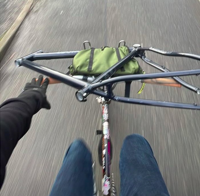 A photo of the saddlebag carrying a bike frame