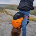 Thumbnail for Person doing a handstand while wearing the backpack